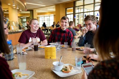 Students hang out in a dining hall