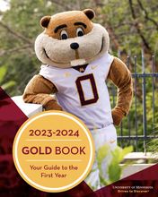 Cover of the 2023-24 Gold Book with Goldie smiling